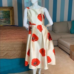 Beautiful buttercream satin dress with poppies
